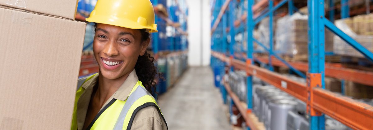 Manual Handling Instructor Refresher, portraitoffemalestaffcarryingcardboardboxesinwarehouse-this